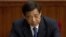 In this March 11, 2012 photo, then Chongqing party secretary Bo Xilai attends a plenary session of the National People's Congress at the Great Hall of the People in Beijing.