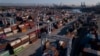 FILE - An aerial image taken on October 15, 2021 shows cargo shipping containers at the Port of Los Angeles in San Pedro, California.