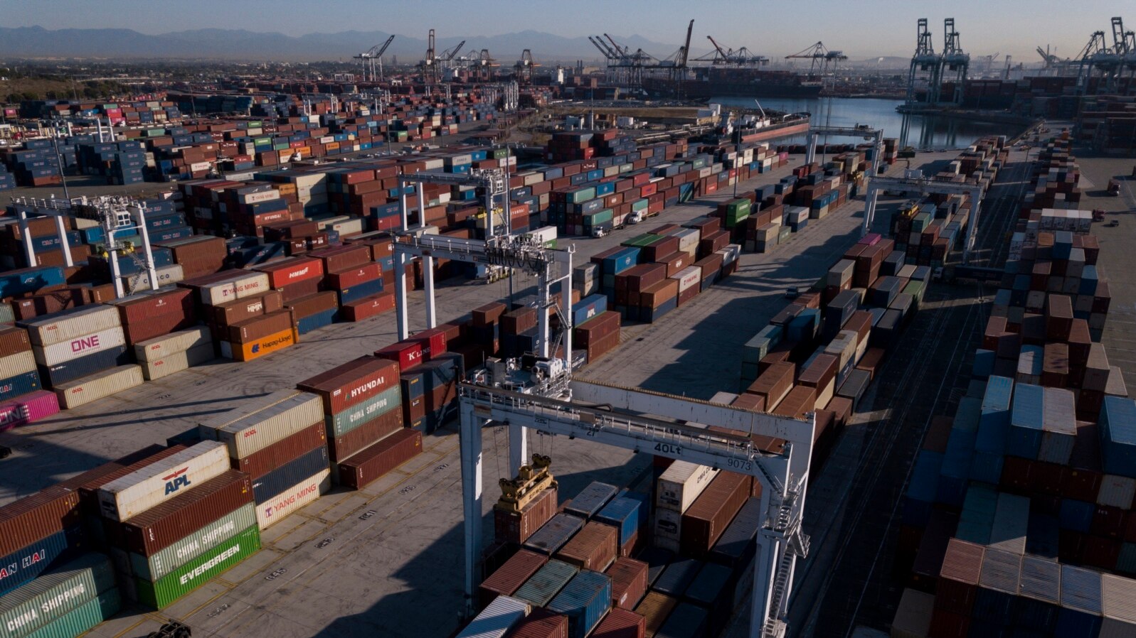 FILE - An aerial image shows cargo shipping containers at the Port of Los Angeles in San Pedro, California, Oct. 15, 2021.