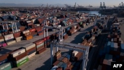 FILE - An aerial image taken on October 15, 2021 shows cargo shipping containers at the Port of Los Angeles in San Pedro, California.