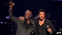 Darius Rucker, left, and Lionel Richie perform "Stuck on You" at a concert last week in Las Vegas, Nevada