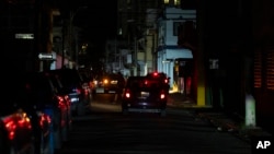 A street is dark during a blackout in San Juan, Puerto Rico, Dec. 31, 2024.