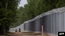 Патрулювання польсько-білоруського кордону у Підляському воєводстві, на північному сході Польщі, 8 червня 2022 року. Фото: Wojtek Radwanski/AFP 