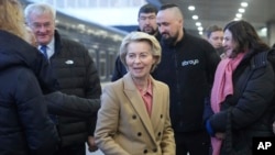 European Commission President Ursula von der Leyen arrives at a train station on the third anniversary of the Russian invasion of Ukraine, Kyiv, Feb. 24, 2025.