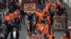 Cognac producers hold placards during a demonstration against Chinese tariff threats, in Cognac, France, Sept. 17, 2024.