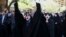 FILE - Iranian protesters chant slogans in front of the Saudi Arabian Embassy in Tehran, Iran, Sunday, Sept. 27, 2015.