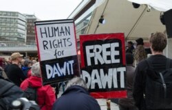 FILE - Protesters demand freedom for journalist Dawit Isaak, who is being held in a prison in Eritrea.
