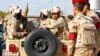 FILE - Military forces look on in North Sinai, Egypt, Dec. 1, 2017.