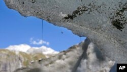 A melting glacier like this one revealed the bodies of two people thought to have gotten lost in the mountains in 1942.