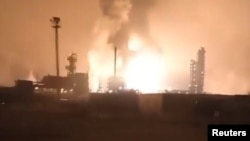 A fire triggered by Ukrainian drone strikes, according to the local authorities, burns at a gas processing plant, amid the Russia-Ukraine conflict, in the Astrakhan region, Russia in this screengrab obtained from social media video released Feb. 3, 2025.