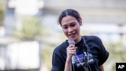 Pro-democracy protest fund-raiser Inthira Charoenpura speaks from a makeshift stage outside Bang Khen Metropolitan Police Station, Bangkok, Thailand, Dec. 21, 2020. 