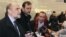 Herman Nackaerts (L) , head of a delegation of the International Atomic Energy Agency (IAEA), speaks to journalists at the airport in Vienna after arriving from Iran, December 14, 2012.