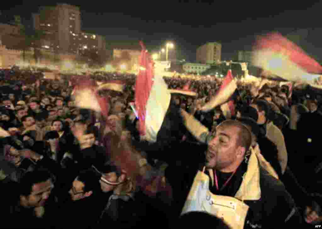 Anti-government protesters celebrate in Tahrir Square in downtown Cairo, Egypt Thursday, Feb. 10, 2011. Egypt's military announced on national television it had stepped in to secure the country and promised protesters calling for President Hosni Mubarak's