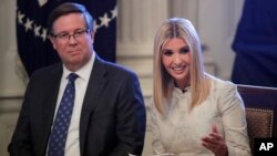 Ivanka Trump, the daughter of President Donald Trump, joined by Jim Lentz, CEO of Toyota North America, speaks during a "Pledge to America's Workers" ceremony in the White House in Washington, July 25, 2019.