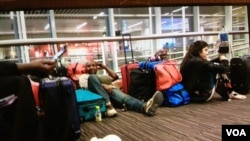 Some of the stranded passengers at Brussels International Airport