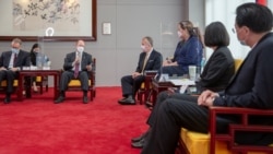Taiwan President Tsai Ing-wen meets U.S. Senators Tammy Duckworth, D-Ill., Dan Sullivan, R-Alaska, and Chris Coons, D-Del., in Taipei, Taiwan, June 6, 2021. (Taiwan Presidential Office handout)