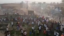 Guinea in mourning after dozens die in soccer stampede