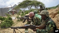 African Union peacekeepers are seen in the Deynile district of the capital Mogadishu, Somalia, October 20, 2011.