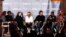 FILE - Cast members of "Mudbound" talk during the "Indiewire in Conversation" panel at Chase Sapphire on Main, during the 2017 Sundance Film Festival in Park City, Utah, Jan. 22, 2017.