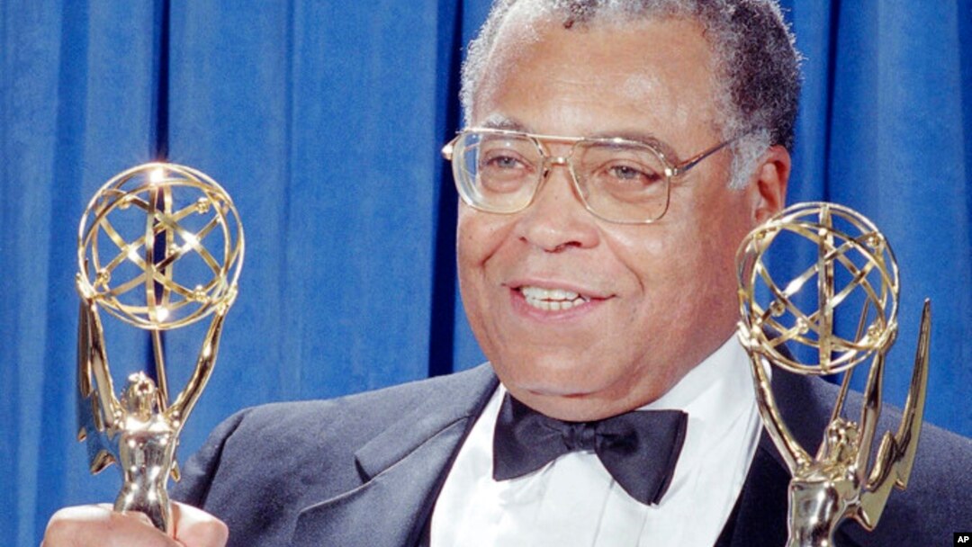 FILE - Actor James Earl Jones holds up his two Emmys for photographers backstage at the 43rd Annual Emmy Awards in Pasadena, Aug. 25, 1991.
