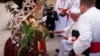 Pope Francis is welcomed by Indigenous people on the day he meets with bishops of Papua New Guinea and Solomon Islands, priests, deacons, consecrated persons, seminarians and catechists at the Shrine of Mary Help of Christians in Port Moresby, Papua New Guinea, Sept. 7, 2024. 