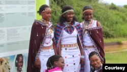 Members of Team Lioness are members are seen in traditional garb on a day off from work. (Courtesy - Patrick Papatiti, Commander of the Olgululului Community Wildlife Rangers)