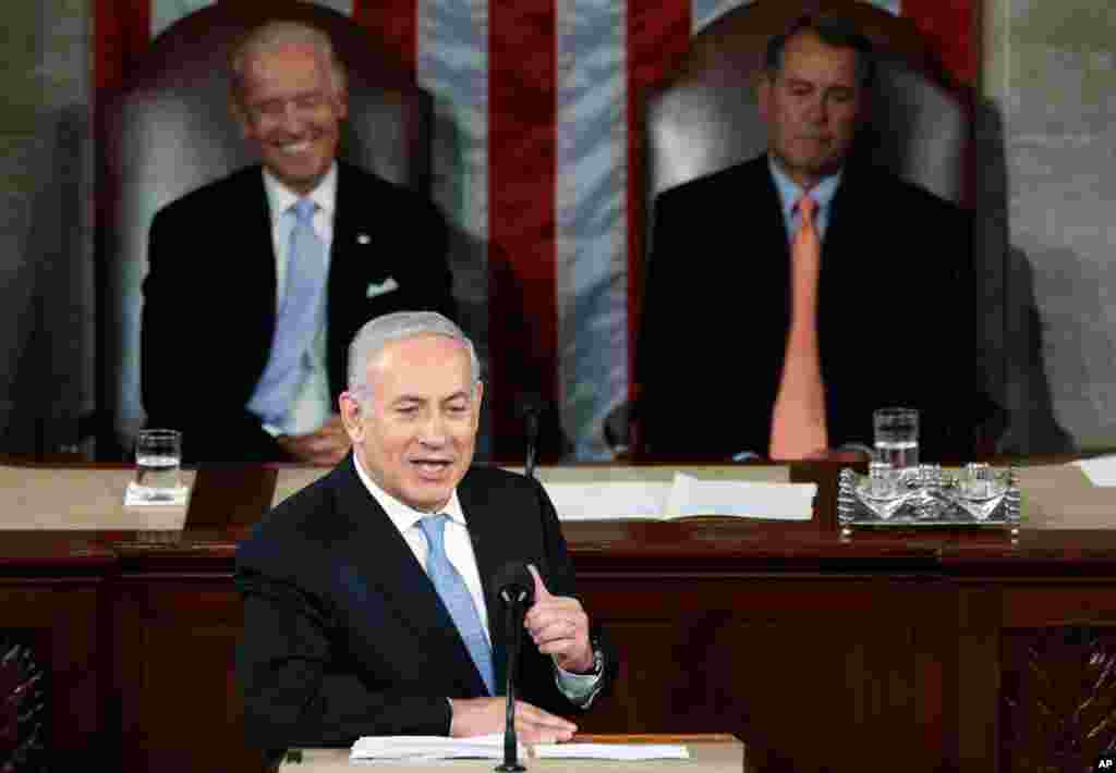 May 24: Israel's Prime Minister Benjamin Netanyahu addresses a joint meeting of Congress in front of U.S. Vice President Joe Biden (L) and House Speaker John Boehner. (Reuters)