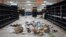 Supermarket displays stand empty and looted following protests caused by a 20 percent hike in gasoline prices, in Veracruz, Mexico, Jan. 7, 2017. 
