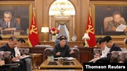 KCNA image of North Korean leader Kim Jong Un at a meeting with senior officials from the Workers' Party of Korea (WPK) Central Committee and Provincial Party Committees in Pyongyang