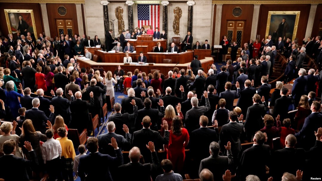 House Speaker Nancy Pelosi (D-CA) administers the oath of office to House members and delegates of the U.S. House of Representatives at the start of the 116th Congress inside the House Chamber on Capitol Hill in Washington, Jan. 3, 2019.