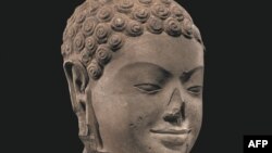 This image released by the US Attorney's Office for the Southern District of New York on December 15, 2023, shows a 7th century Head of Buddha.