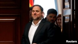 FILE PHOTO: Jailed Catalan politician Oriol Junqueras leaves after getting his parliamentary credentials at Spanish Parliament, in Madrid, Spain, May 20, 2019. 