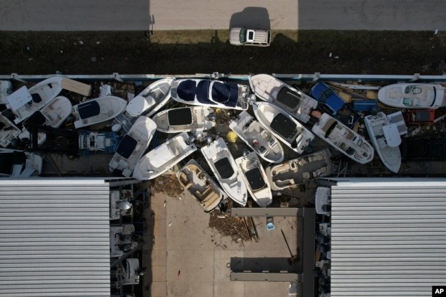 Boats are seen jumbled at a marina in Grove City, Florida, following Hurricane Milton, Oct. 12, 2024.