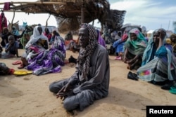 FILE - Adam Mohammed, a 78-year-old Quran teacher, who fled the conflict in Sudan's Darfur region, said he witnessed the beheadings of two men and execution of others by the Rapid Support Forces (RSF) and Arab militiamen, in Adre, Chad August 2, 2023.