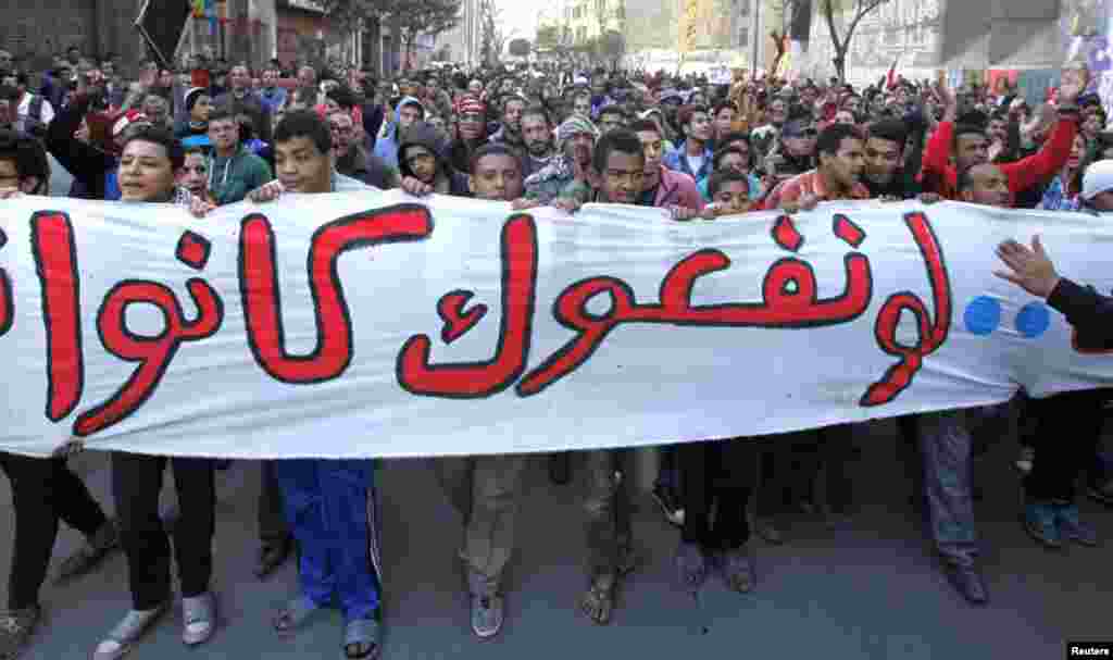 Protesters take part in a march during the second anniversary of the resignation of Hosni Mubarak, at Tahrir Square in Cairo, February 11, 2013. 