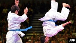 Turkey's team competes at the Men's Kata Team competition at the 22nd Karate World Championships on November 9, 2014, in Bremen, Germany. Karate is among the sports to be added to the 2020 Tokyo Games.