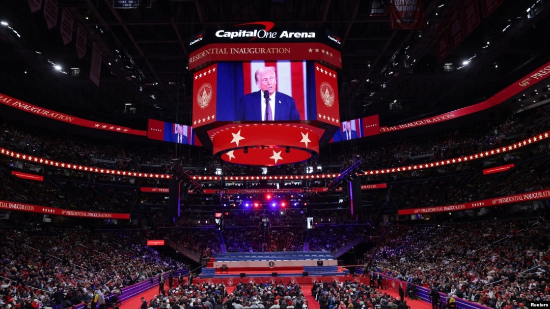 U.S President Donald Trump is shown on a screen on the Inauguration Day of his second presidential term, inside Capital One Arena in Washington on Jan. 20, 2025.