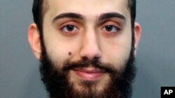 FILE - This April 2015 booking photo released by the Hamilton County, Tennessee, sheriff's office shows a man identified as Muhammad Youssef Abdulazeez.