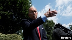 White House chief economic advisor Larry Kudlow speaks with reporters outside the West Wing of the White House in Washington, June 27, 2019.