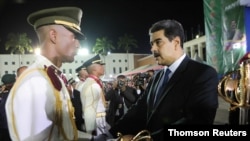 Venezuela's President Nicolas Maduro takes part in a military graduation ceremony in Caracas, July 8, 2019.