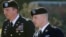 FILE - Army Sgt. Bowe Bergdahl, right, arrives for a pretrial hearing at Fort Bragg, N.C., with his defense counsel Lt. Col. Franklin D. Rosenblatt.