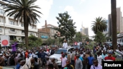 Kenyan opposition leader of the Coalition for Reforms and Democracy (CORD), Raila Odinga (C) leads his supporters during a protest near the premises hosting the headquarters of Independent Electoral and Boundaries Commission (IEBC) to demand the of the electoral body ahead of next year's election in Nairobi, Kenya June 6, 2016. 