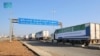 Trucks carrying aid from Saudi Arabia cross into Syria through Nasib Border Crossing, also known as Jaber Border Crossing, an international border crossing between Syria and Jordan, Jan. 6, 2025. (Saudi Press Agency/Handout via Reuters)