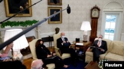 U.S. President Joe Biden and Vice President Kamala Harris meet with Senate Majority Leader Chuck Schumer (D-NY) and Democratic senators to discuss efforts to pass coronavirus relief legislation in the Oval Office at the White House, Feb. 3, 2021.