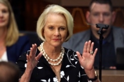 FILE - Cindy McCain, wife of former Arizona Sen. John McCain, waves at the Capitol in Phoenix, Jan. 13, 2020.