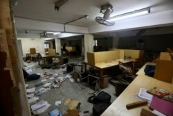 FILE - The library of the Jamia Millia Islamia University that was stormed by police Sunday, in New Delhi, India, Dec.16, 2019.