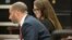 FILE - In this April 25, 2019, photo, Anna Sorokin, right, and her lawyer Todd Spodek react as the jury foreman reads the verdict in New York. Sorokin, a fake German heiress, swindled tens of thousands of dollars from New York banks and hotels.