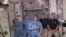 This photo provided by NASA shows Bob Behnken and Doug Hurley, far right, joining the the crew at the International Space Station, after the SpaceX Dragon capsule pulled up to the station and docked Sunday, May 31, 2020.