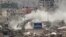 Image shows shelling of the Al-Qaboun neighborhood in rural Damascus, Syria, July 15, 2013. 