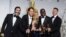 Anthony Katagas, from left, Jeremy Kleiner, Dede Gardner, Steve McQueen, and Brad Pitt pose in the press room with the award for best picture of the year for "12 Years a Slave" during the Oscars.